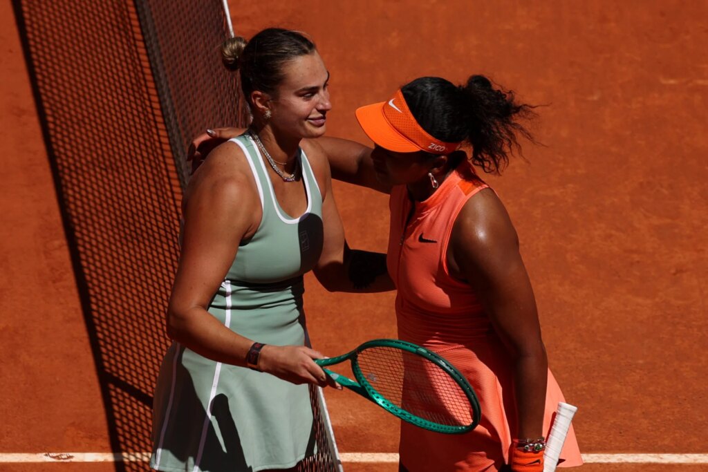 Naomi Osaka reacts after being told that she will play Aryna Sabalenka next at Roland Garros