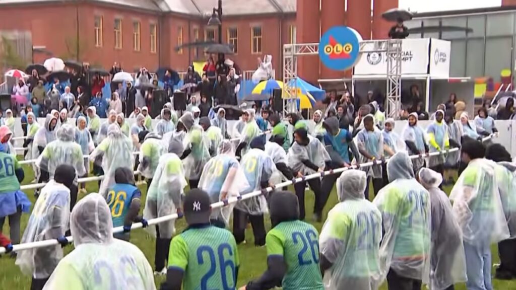 Canadians set world record with largest game of human foosball ahead of World Cup 254 people playing foosball.