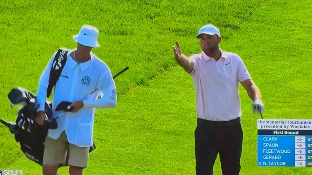 Scottie Scheffler hits into the water. Then comes some words 