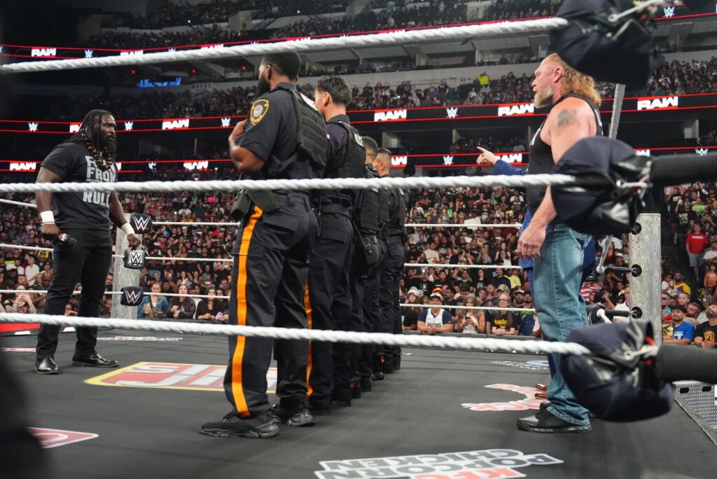Oba Femi and Brock Lesnar in ring during Monday Night RAW  - Source: Getty