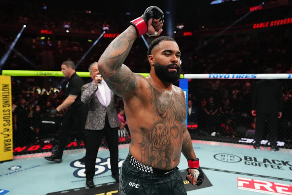 Gable Steveson reveals what he told Daniel Cormier after successful UFC 329 debut: “I’m a big DC fan” Gable Steveson celebrates after defeating Elisha Ellison at UFC 329