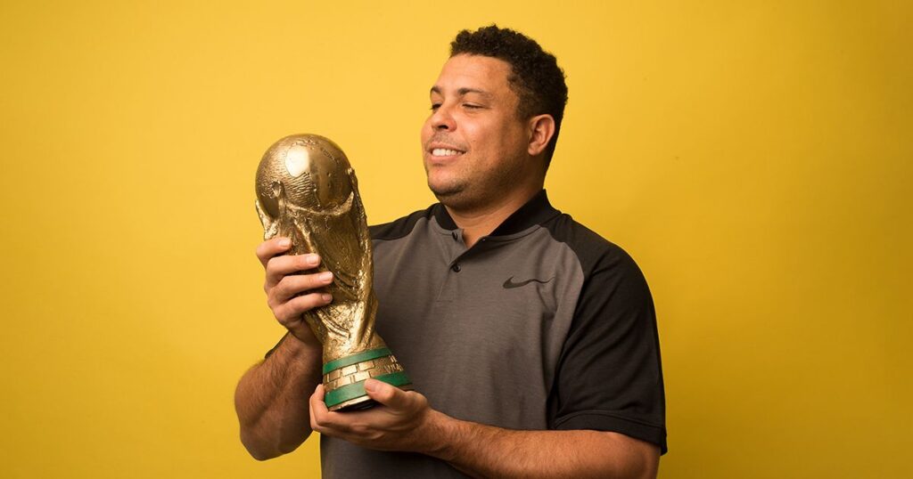 Quiz! Can you name every World Cup semi-finalist ever? Ronaldo Nazario looks at his 2002 FIFA World Cup winners trophy for Brazil during a photo session on March 12, 2018 in Madrid, Spain.