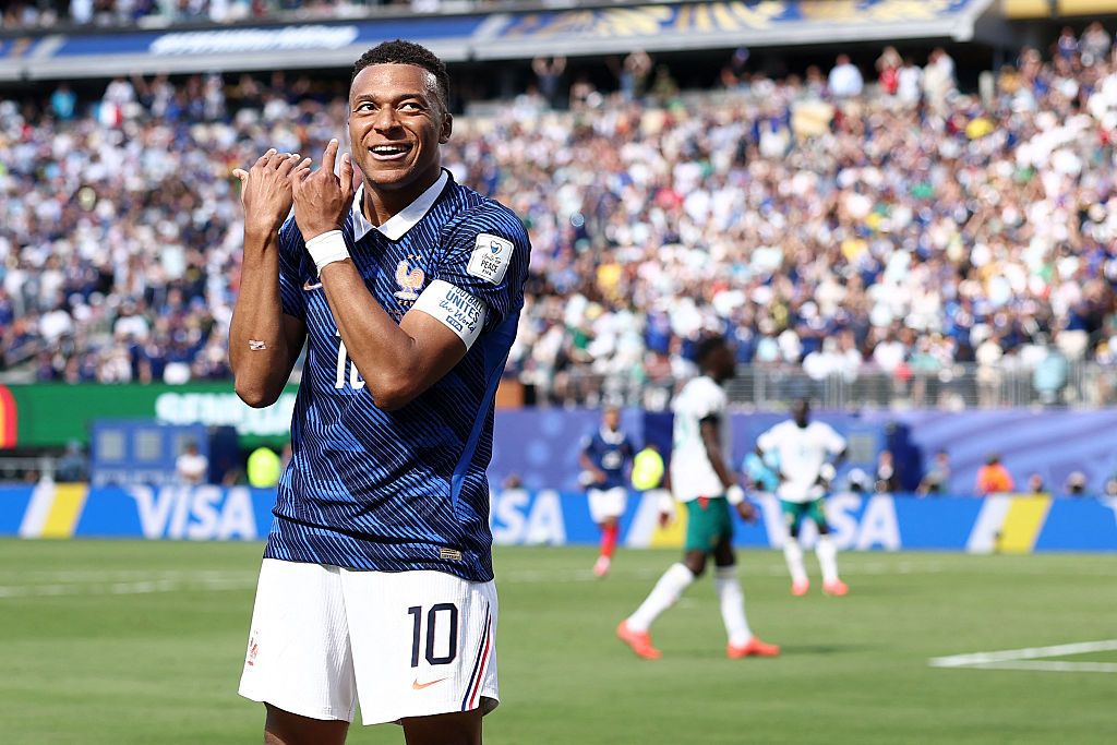 The Big Kylian Mbappe Football Quiz Kylian Mbappe celebrates by pretending to play the flute after scoring his team's first goal during the 2026 World Cup Group I football match between against Senegal at the New York/New Jersey Stadium
