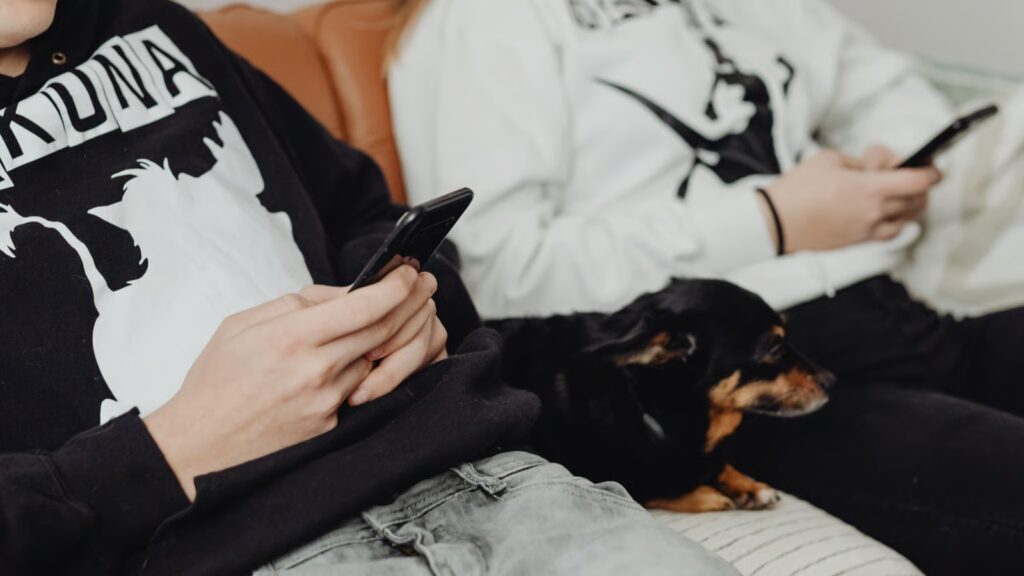 stock photo of teenagers using phones