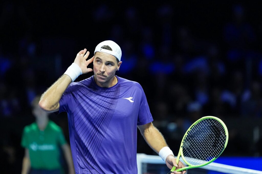 Morning mate! Jan-Lennard Struff reacts after beating Novak Djokovic in shocking upset at the Basel Open