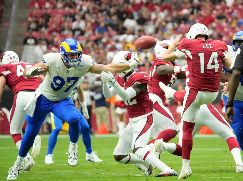 Sep 25, 2022; Glendale, Ariz., U.S.; Los Angeles Rams defensive tackle Michael Hoecht (97) blocks a punt by Arizona Cardinals - Source: Imagn