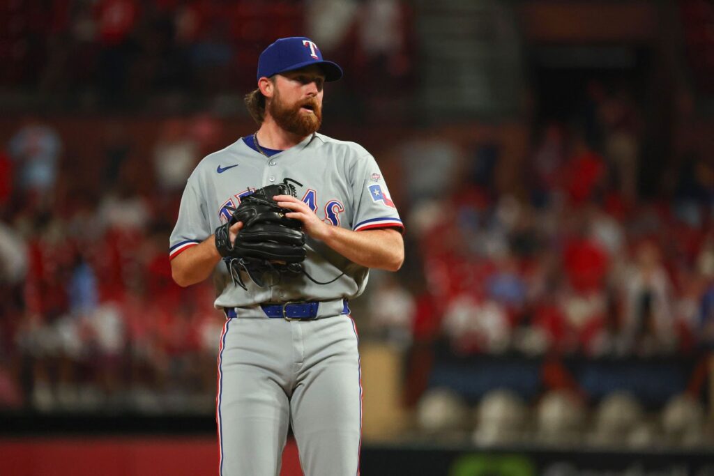 PICTURES: Robert Ahlstrom’s girlfriend Amelia Dineen dons brown bikini with rhinestones in pool photoshoot Texas Rangers v St. Louis Cardinals - Source: Getty
