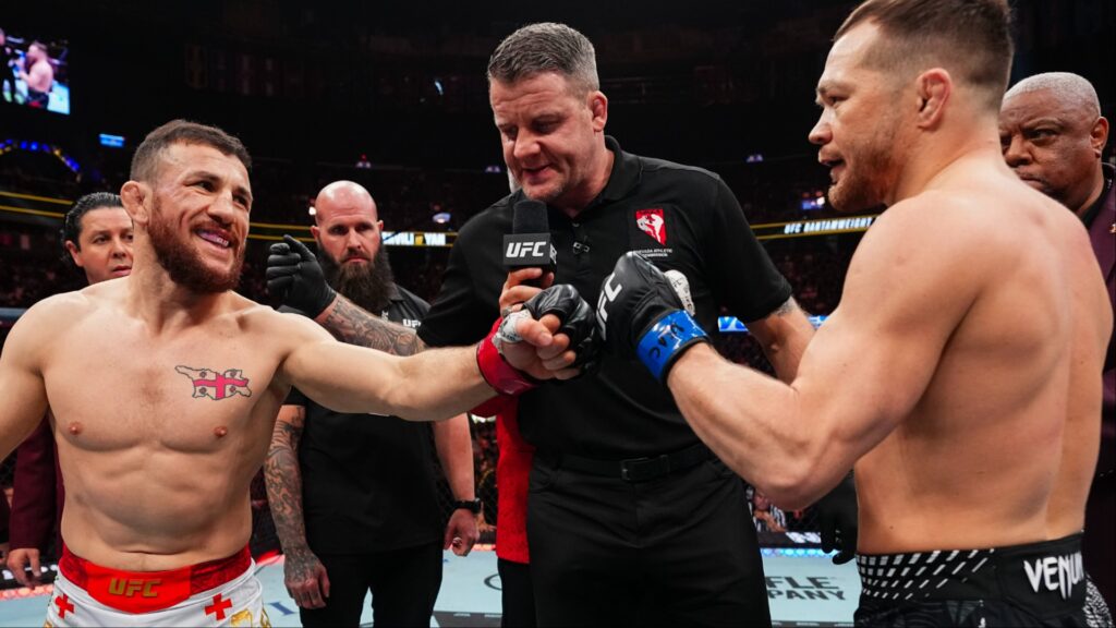 UFC 333 | Pro fighters make their picks for Petr Yan vs. Merab Dvalishvili 3 title fight Merab Dvalishvili and Petr Yan touch gloves at UFC 323