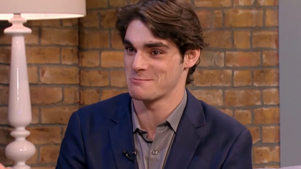 Walter White Jr Breaking Bad actor RJ Mitte dies age 34 Character showcase in Roblox Legends ReWritten with the game's logo and 'CODES' text displayed over it.