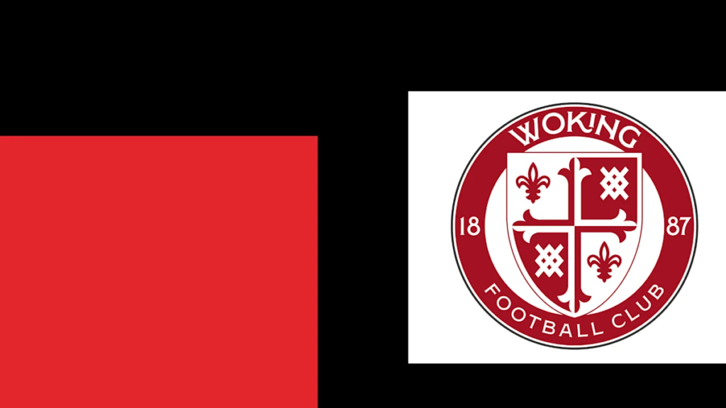Woking sign defenders McArthur and Grant Woking sign defenders McArthur and Grant